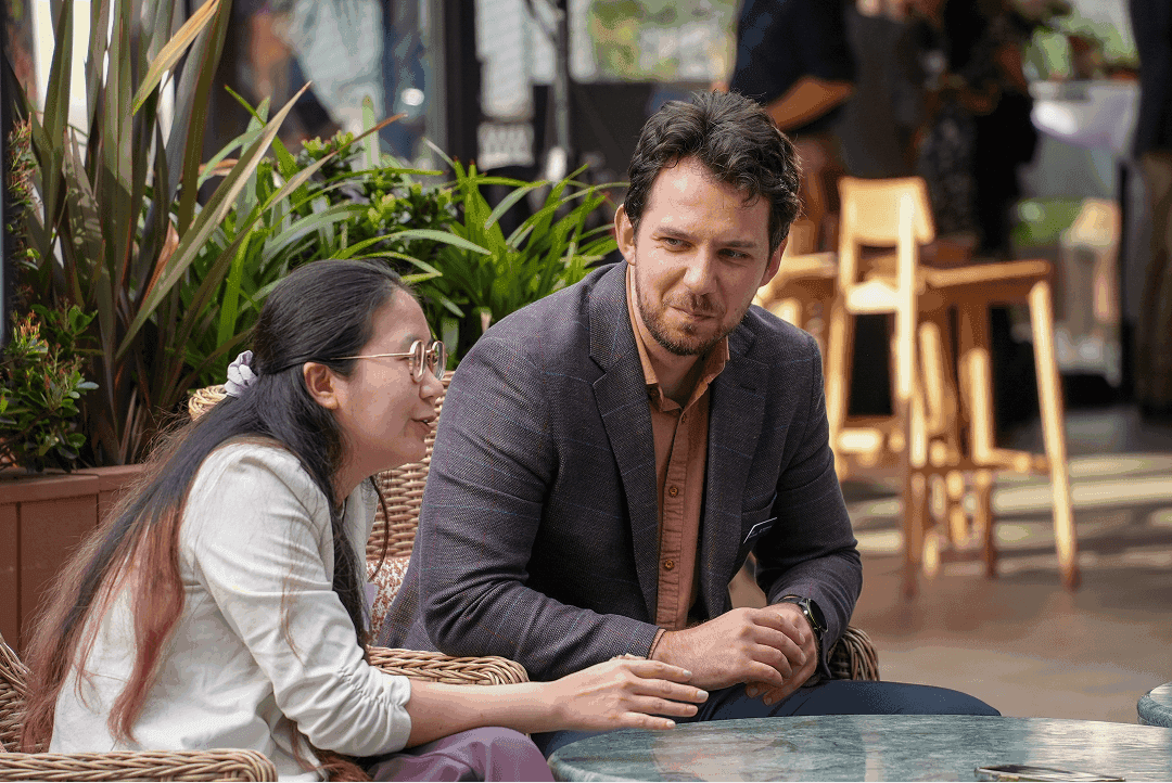 Two people talking